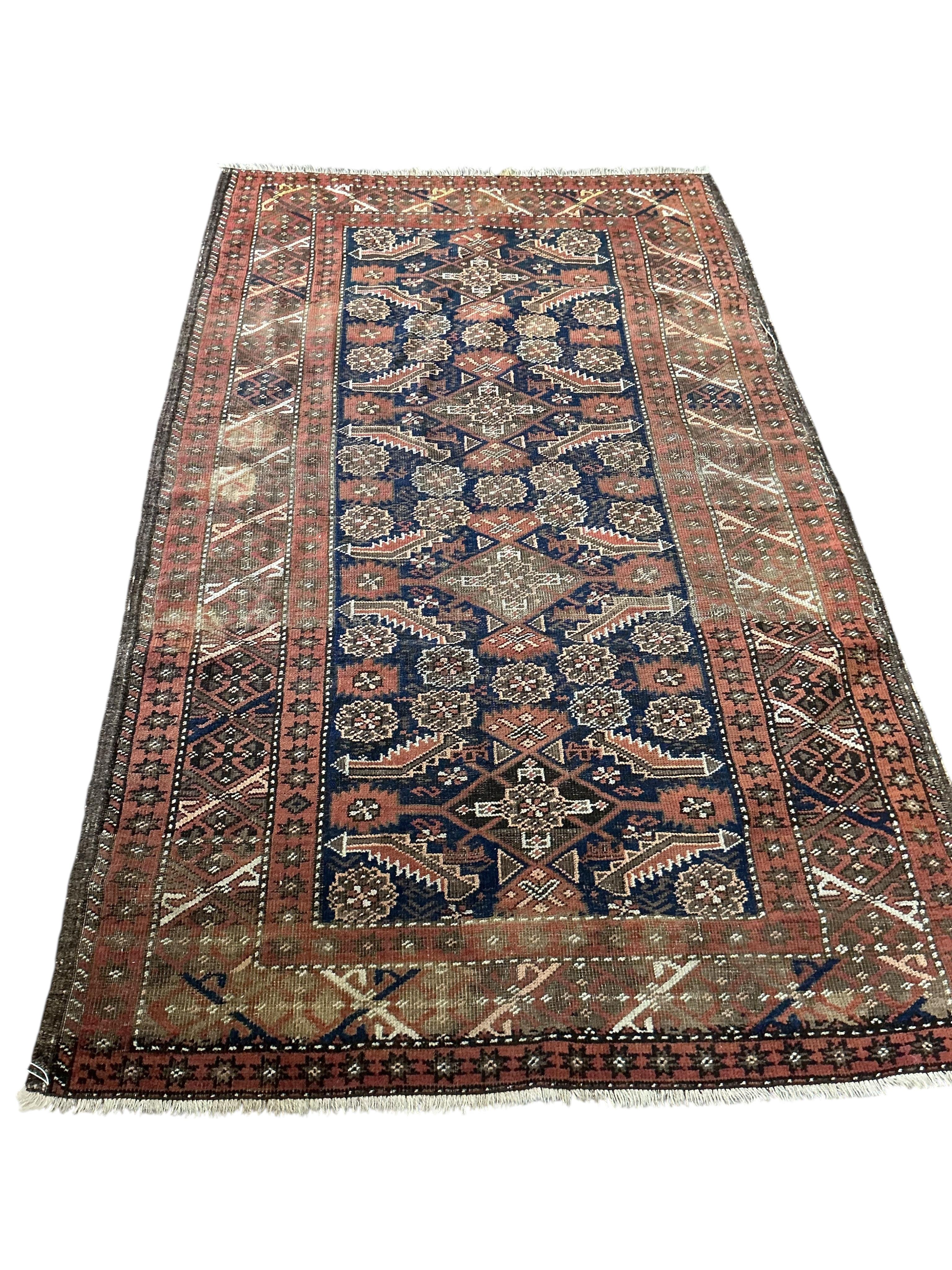 A late 19th century North West Persian blue ground rug, 206 x 123cm